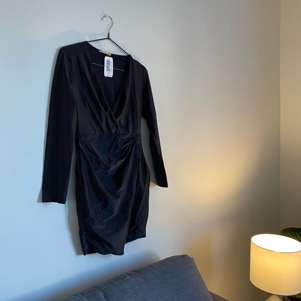 Brand new wrap around dress from envy